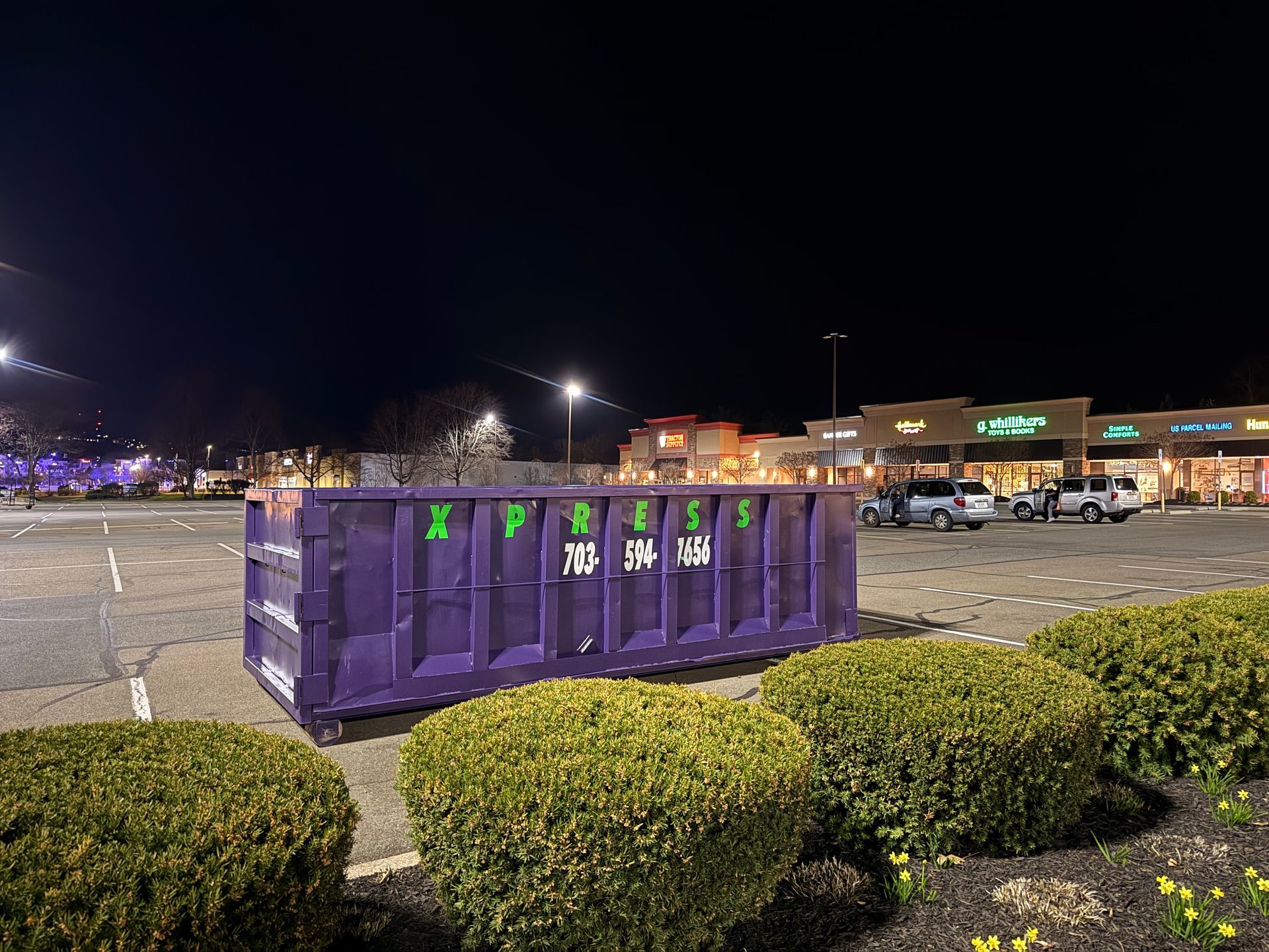 commercial dumpster rental in Warrenton VA at shopping center with 30 yard roll-off container by Xpress Dumpster Rentals