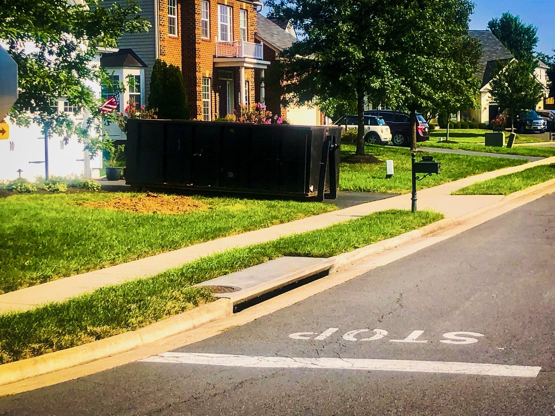 Roll-off dumpster placed on a residential driveway in Gainesville, VA
