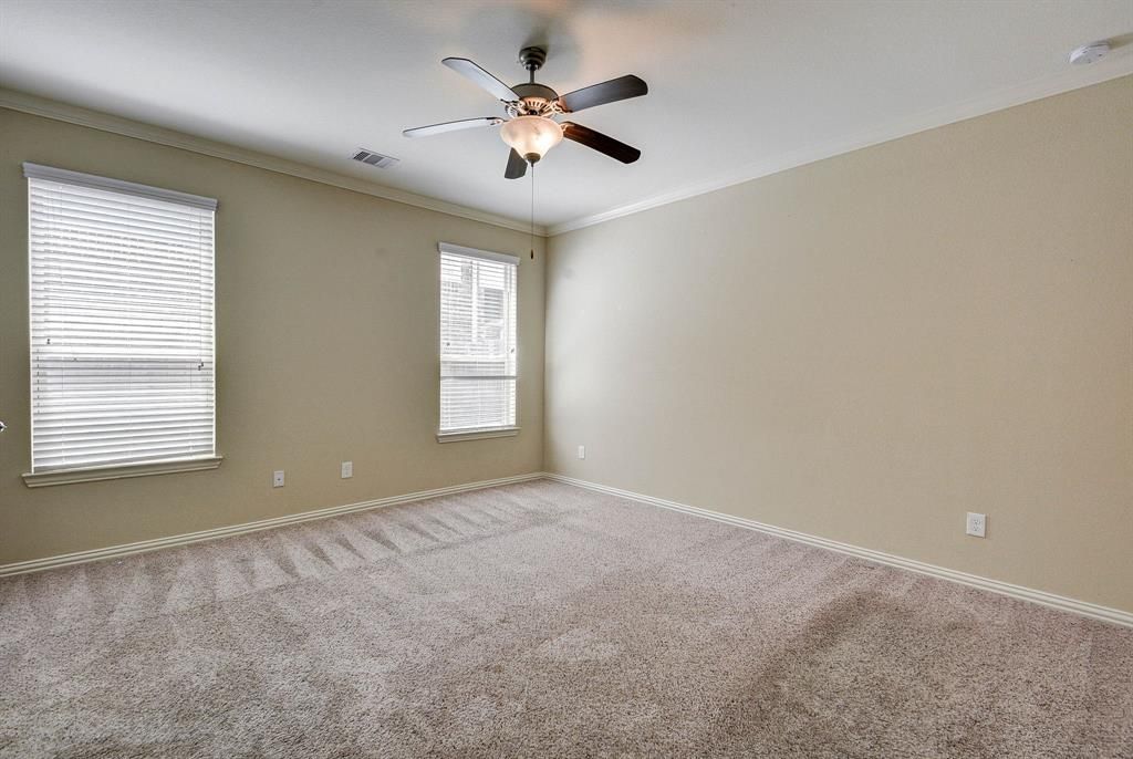 Before: A luxuriously empty bedroom of a home in Houston, Texas.