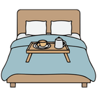 Bed with blue blanket, two pillows, and a tray holding tea and a teapot.