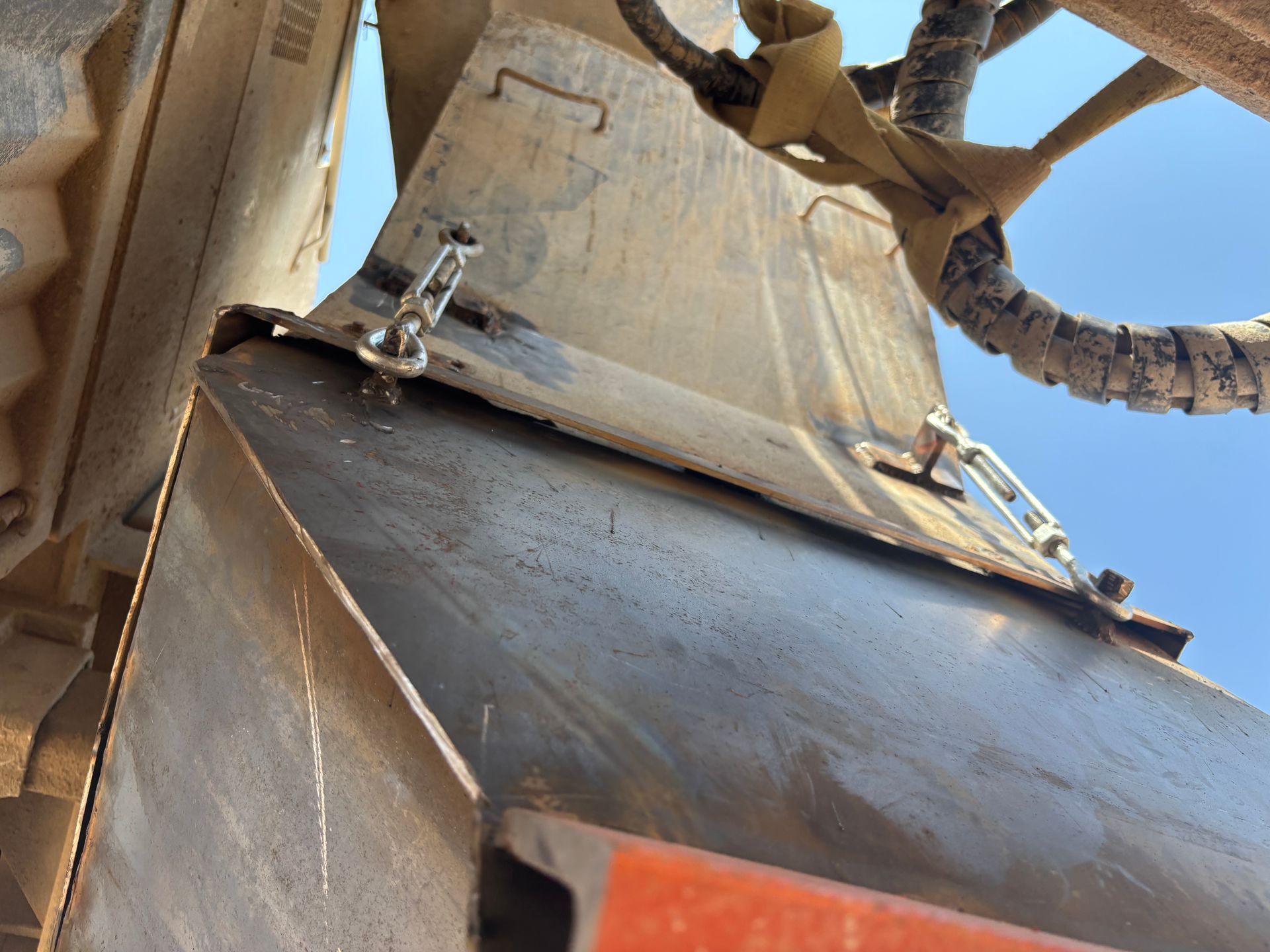 Metal machinery with visible rivets and wiring.