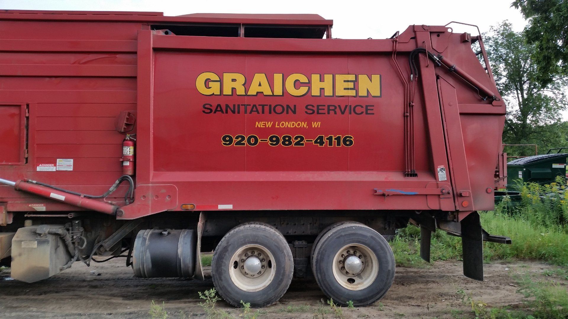 Red trailer with decal on the side