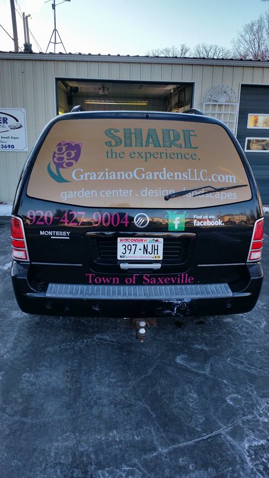 Rear of van with Graziano Gardens LLC on it