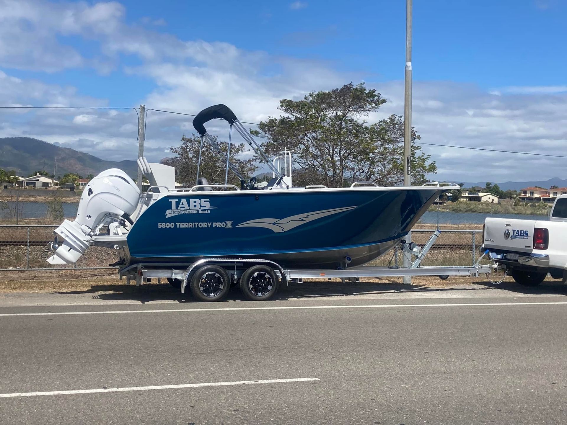 Aluminum Boat on a Trailer in Front of a Business — In Tune Marine in West End, QLD