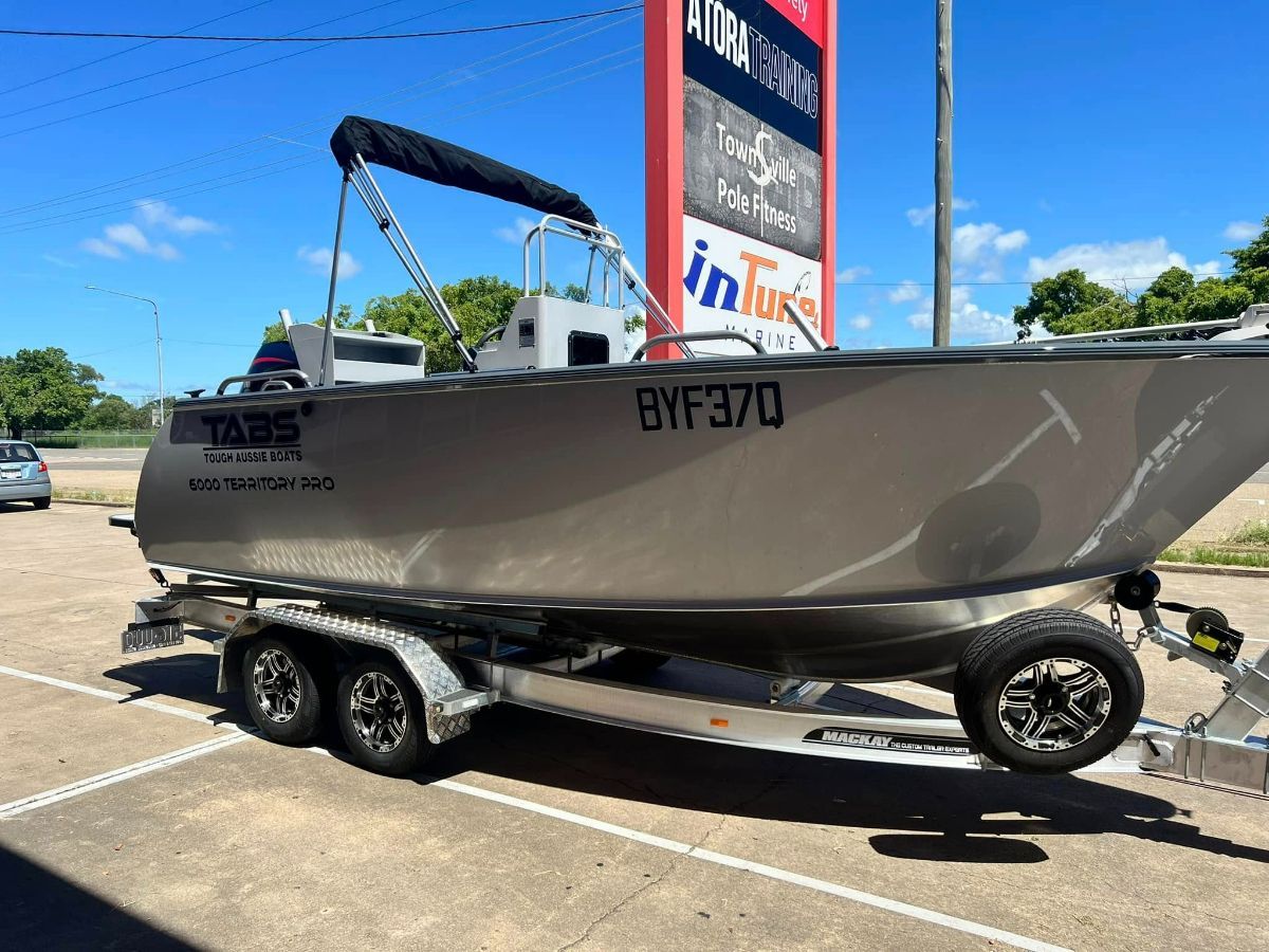 Silver Motorboat on a Trailer — In Tune Marine in West End, QLD