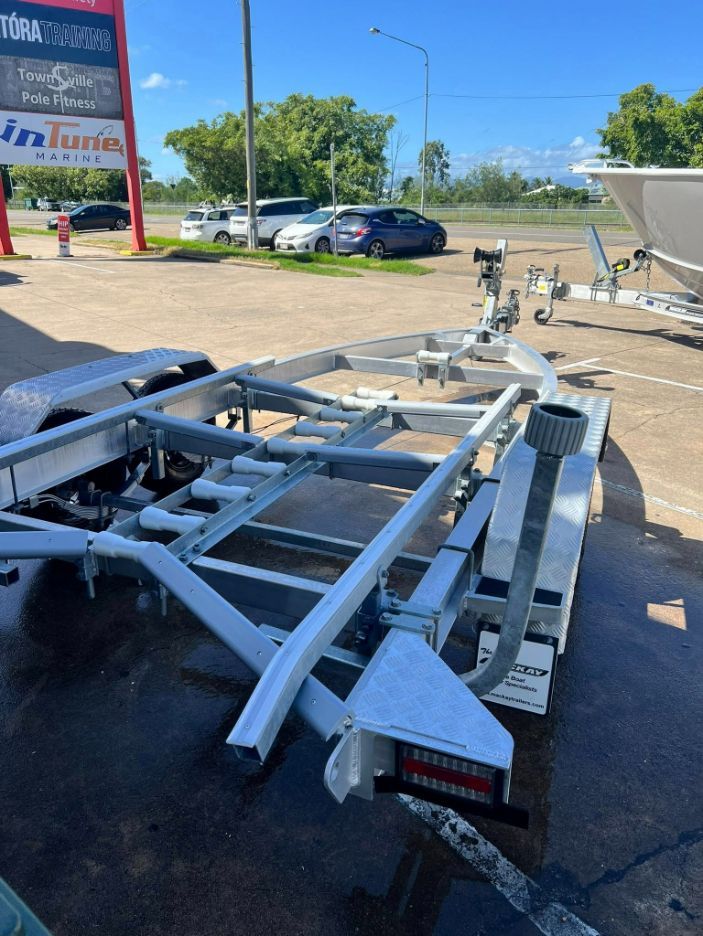 Boat Trailer on Asphalt, Outdoors on a Sunny Day — In Tune Marine in West End, QLD