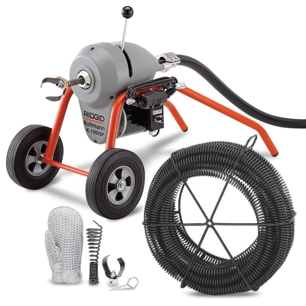 RIDGID drain cleaning machine with coiled cable, safety glove, and accessories.