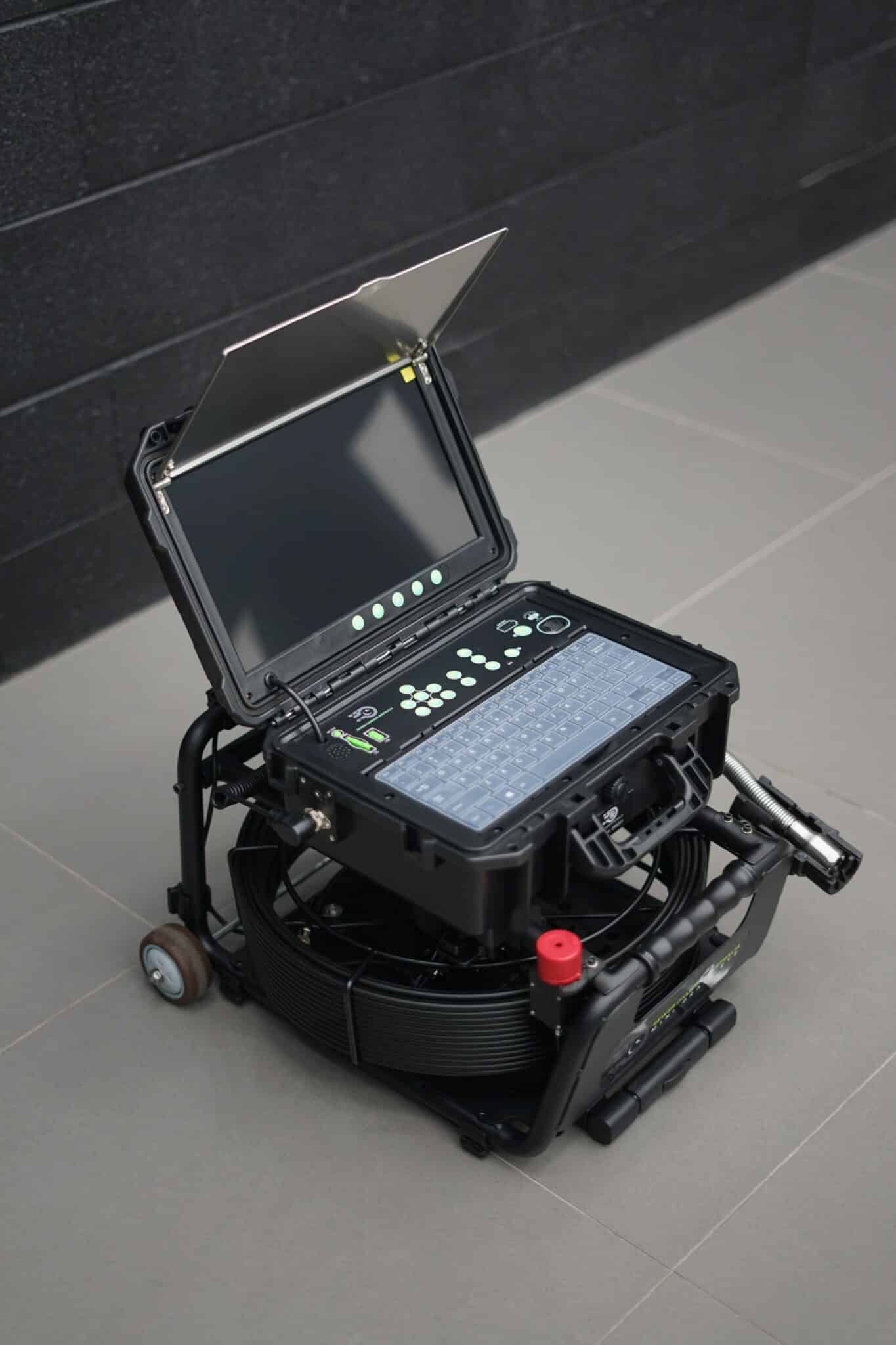 Black Tech Case With Screen and Keypad, Mounted on Wheels in an Indoor Setting — JC Hire in Bli Bli, QLD