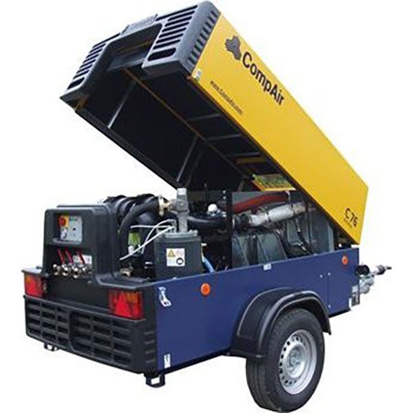 A Compact Air Compressor is Sitting on a Trailer — JC Hire In Bli Bli, QLD