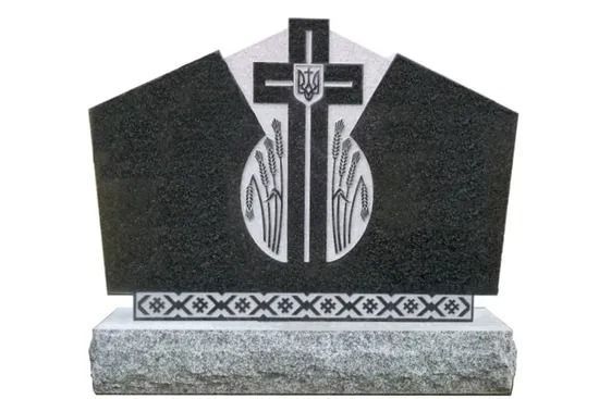 Black headstone with a cross and floral engraving on a gray base