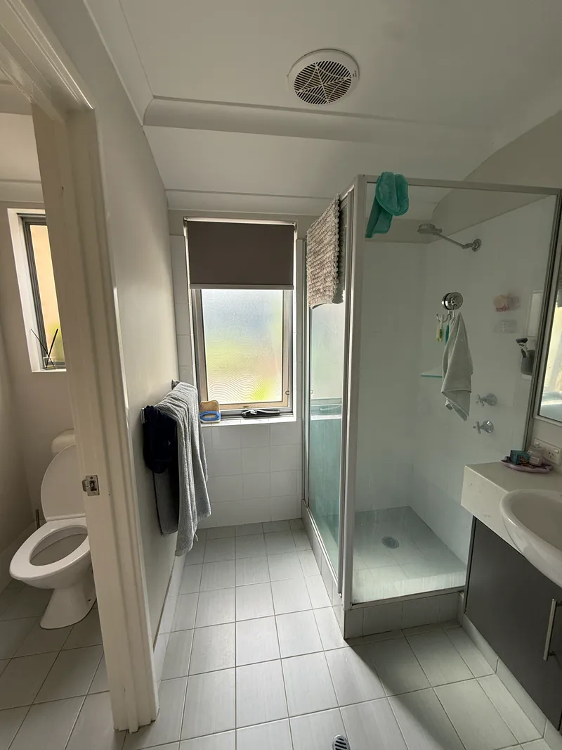 Old bathroom vanity space before complete renovation