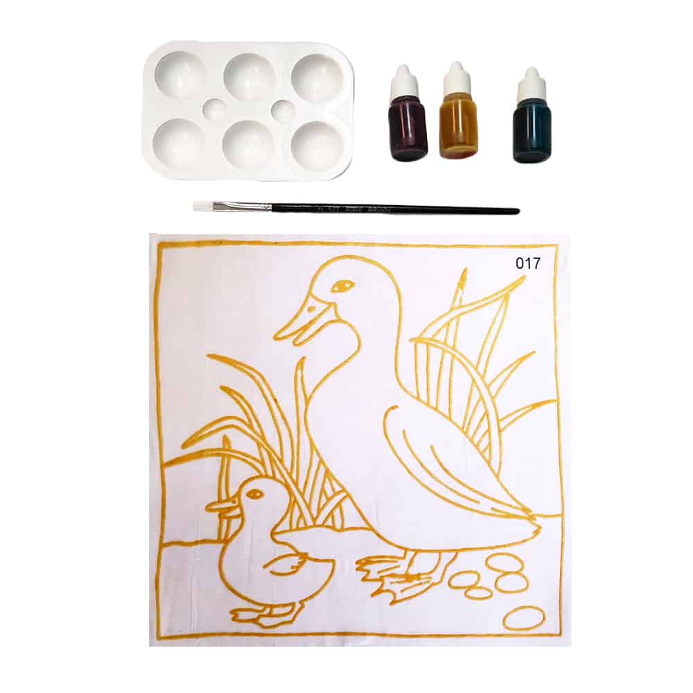 Painting kit with duck outline on fabric, paints, palette, and brush.
