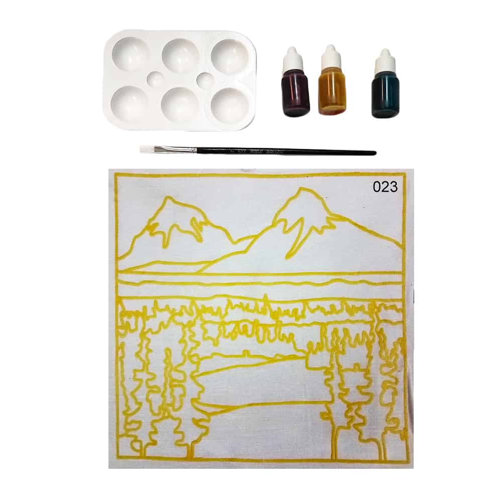 Painting kit with landscape outline, paints, palette, and brush.