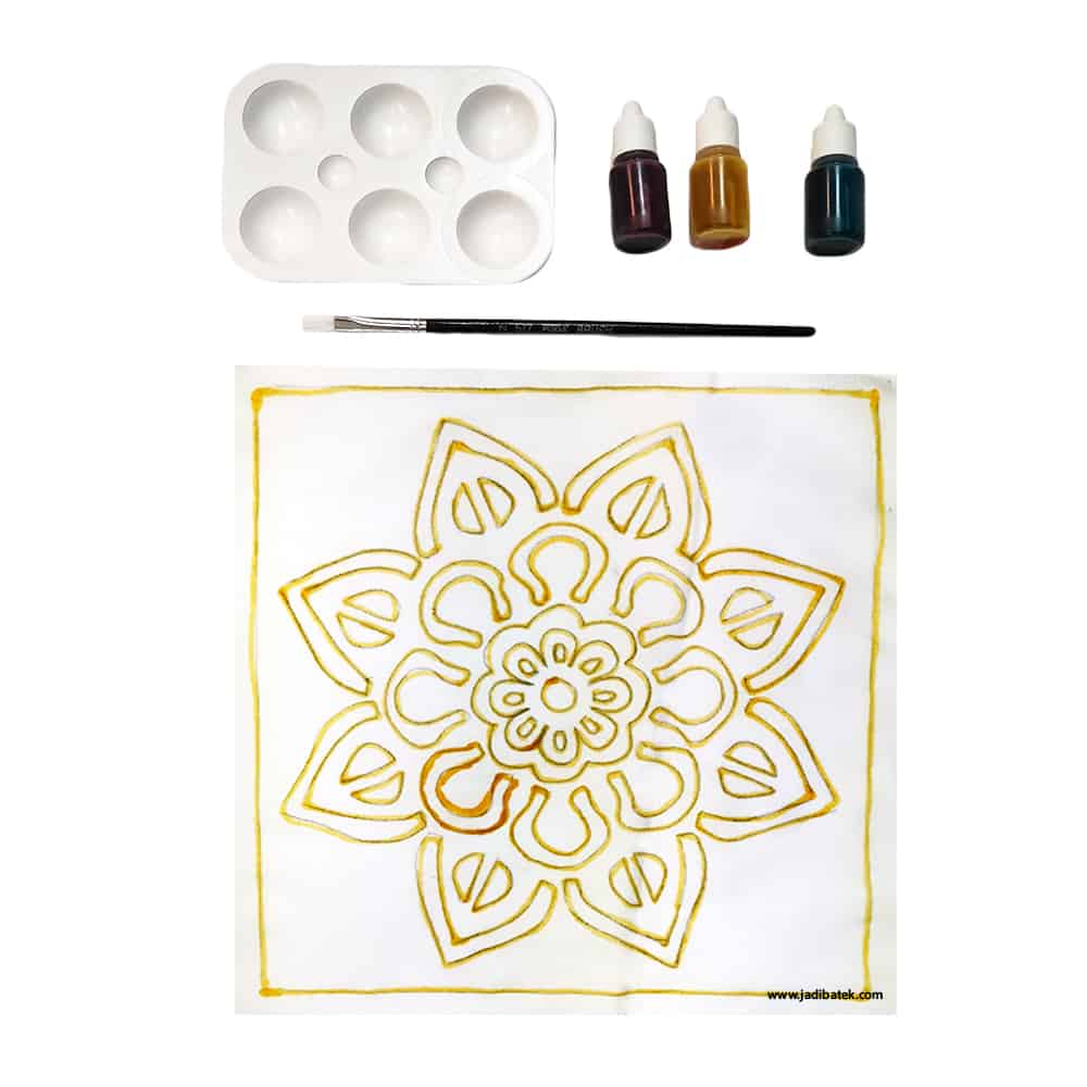 Art kit: mandala design on fabric, paint bottles, palette, brush.