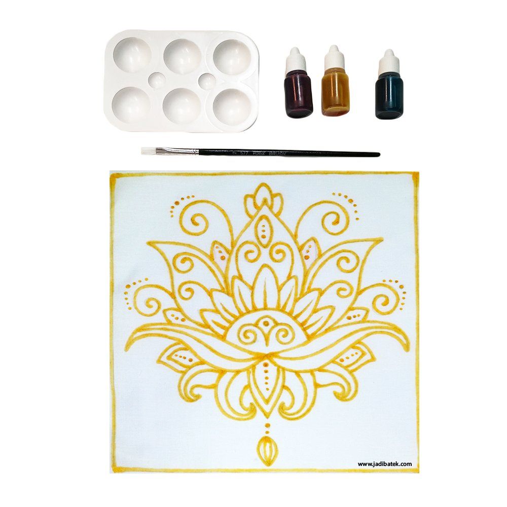 Painting kit with a gold lotus design, paint, palette, brush, and ink bottles.
