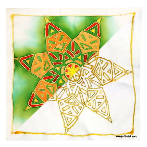 Colorful starburst design on silk scarf, half green, half white with gold outline.