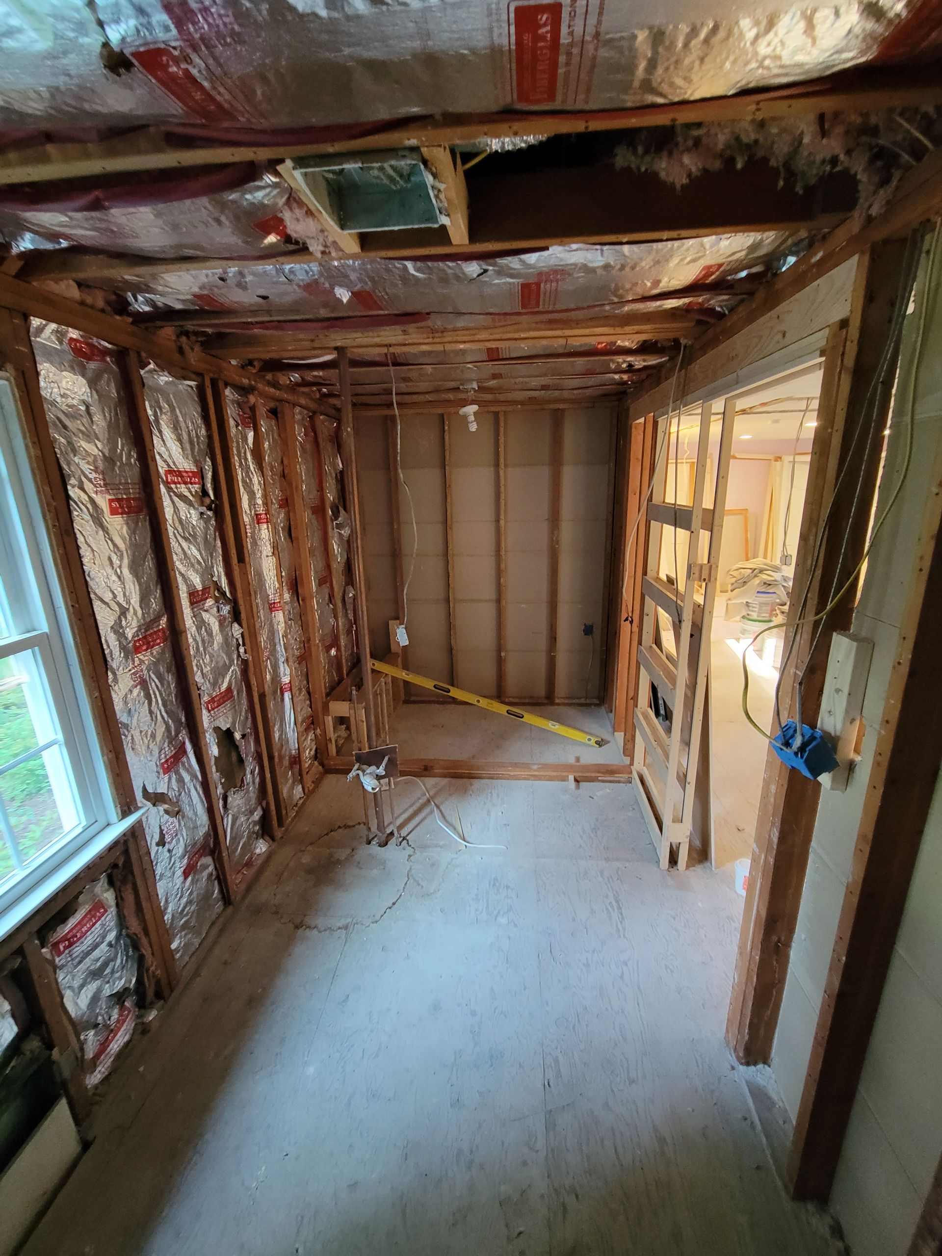 A room with a lot of insulation on the walls and ceiling.
