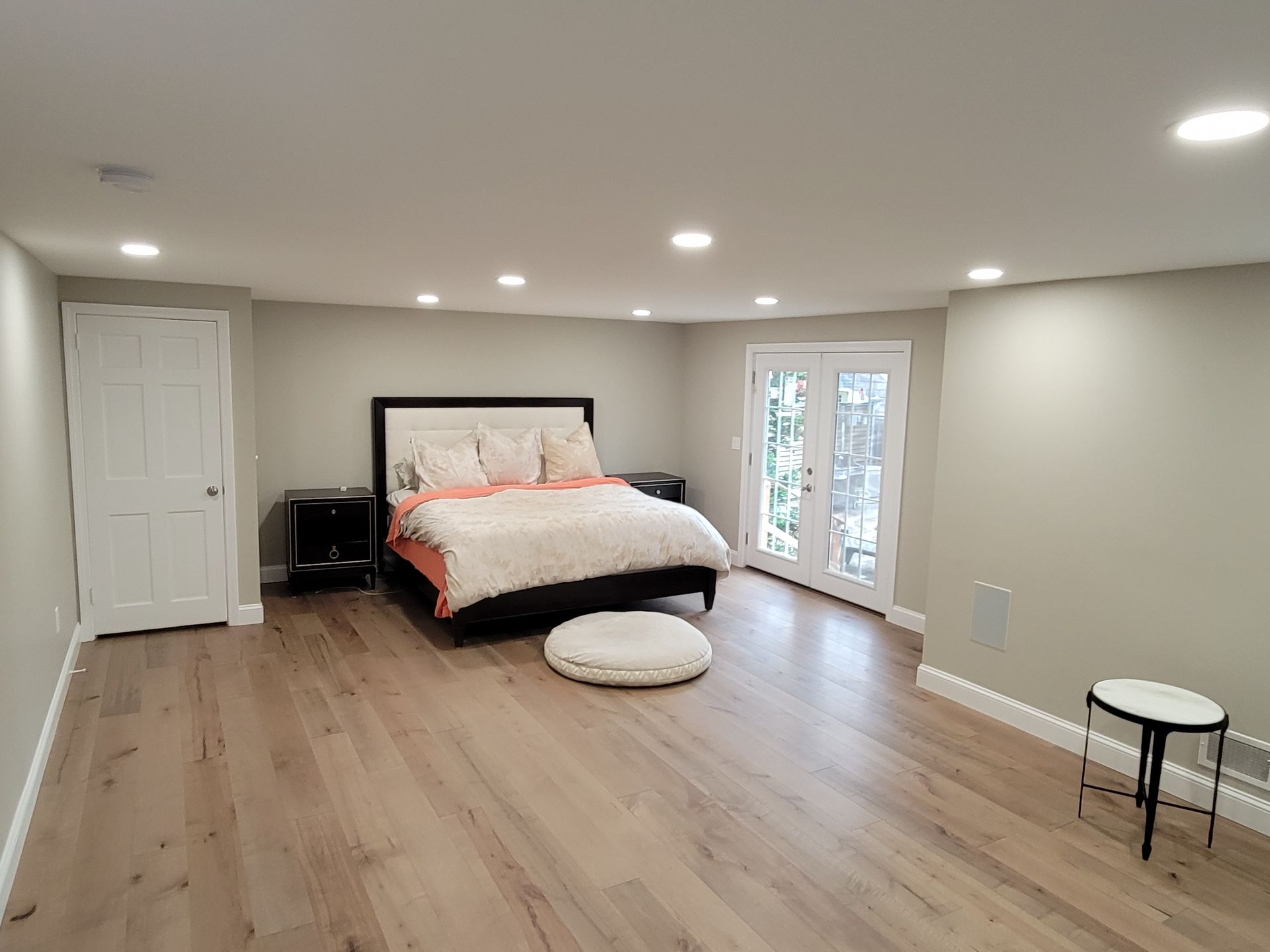 There is a large bed in the middle of the room.