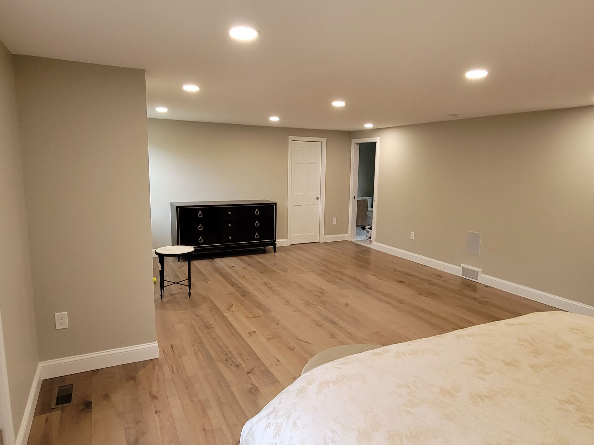 There is a bed in the middle of the room.