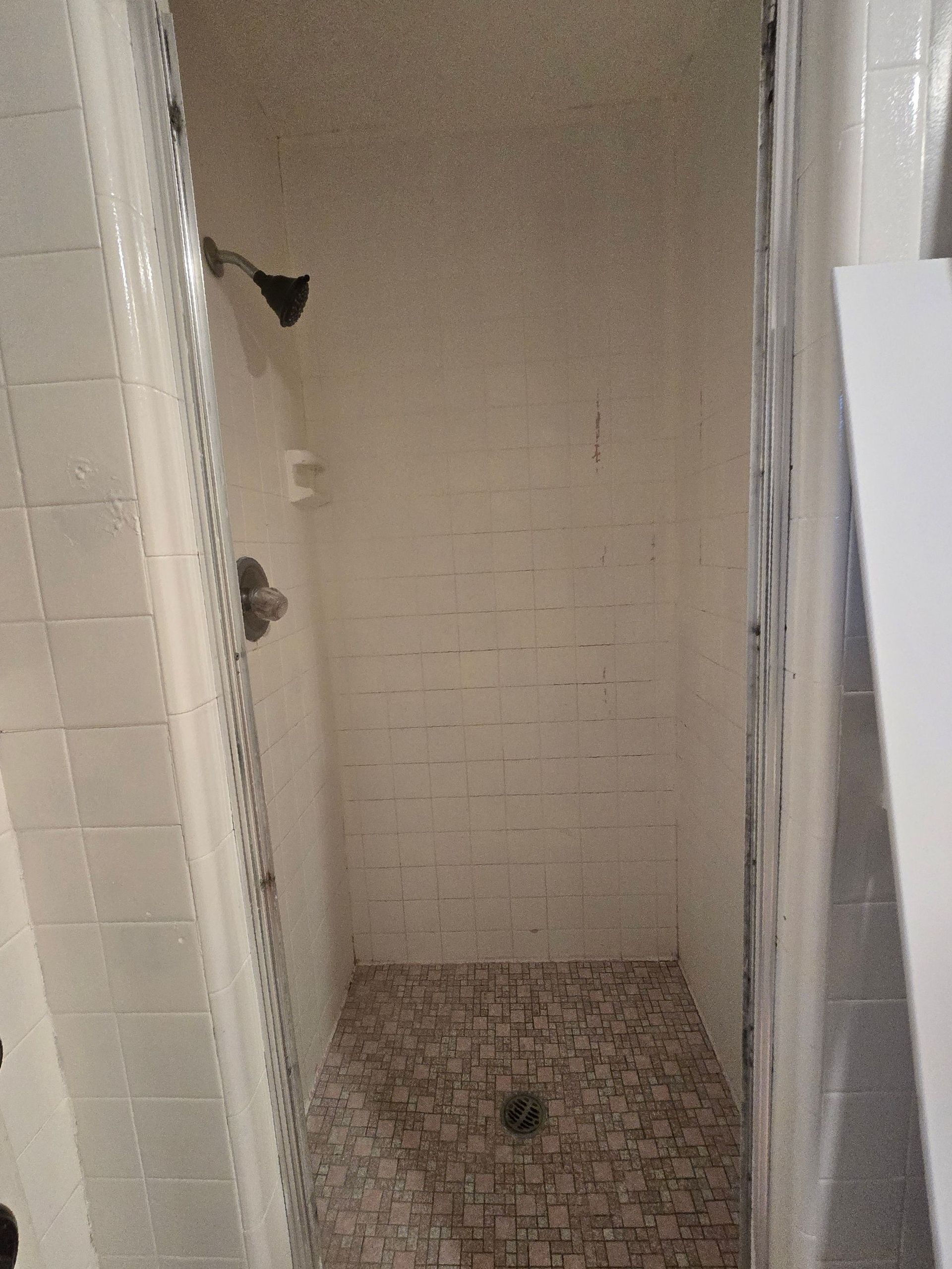 A before and after photo of a bathroom remodel.
