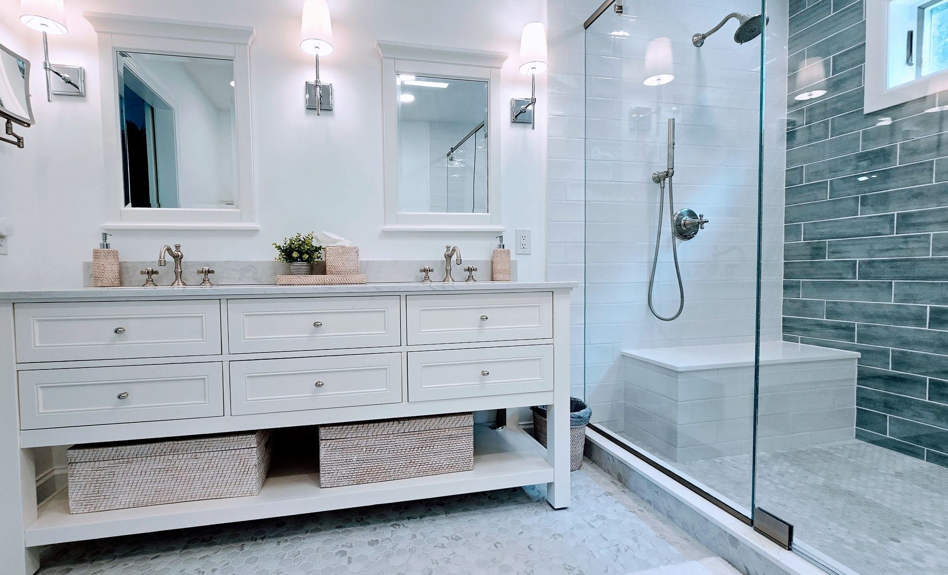 Modern bathroom remodel in Rocky Hill, CT completed by First Choice Bathroom Remodeling with gray and green tile wall, white tile floor, window, and chrome fixtures