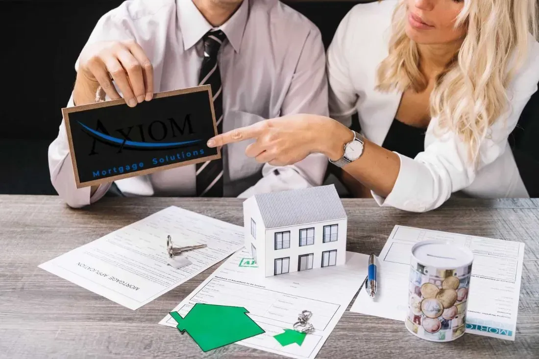 woman pointing chalkboard loewen group logo mortage mortgage broker burlington