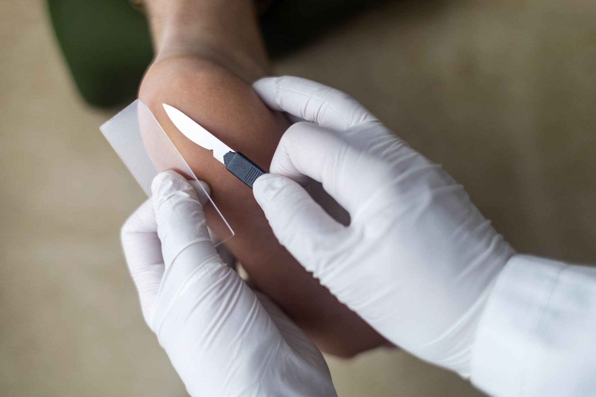 Medical professional performing minor foot procedure