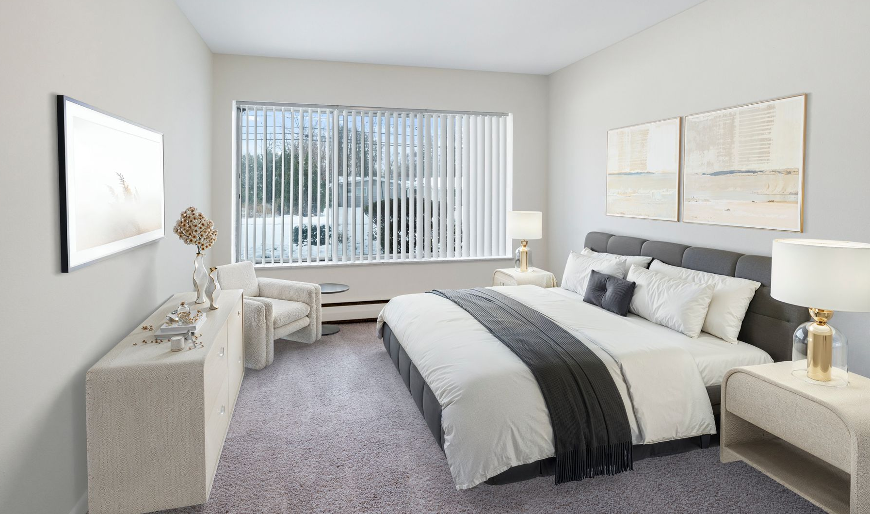Bright bedroom with a bed, nightstands, dresser, window blinds, and neutral decor