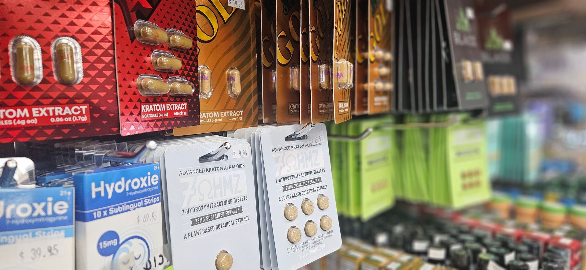 A wall of kratom products, featuring extracts, shots and 7OH products.