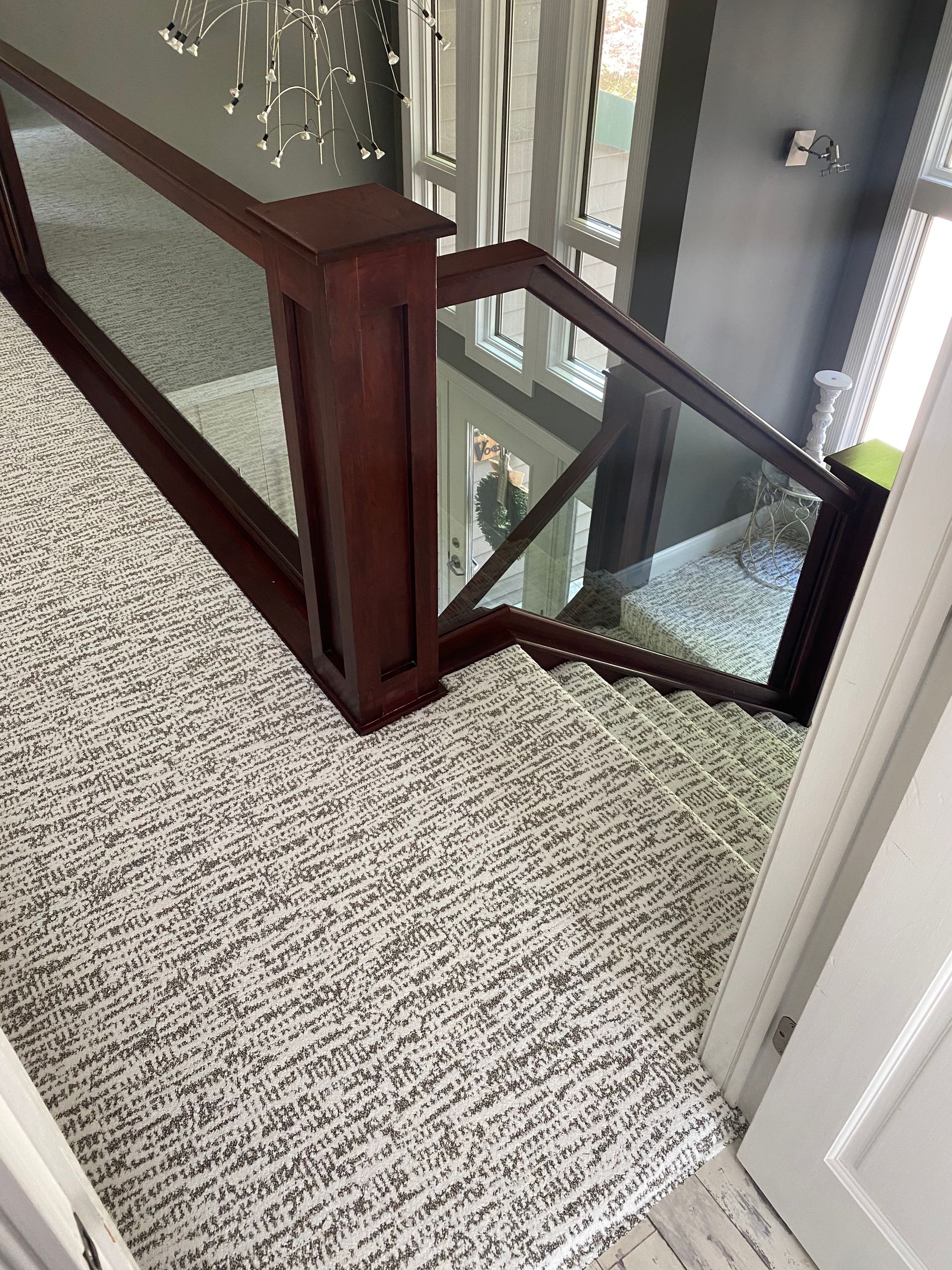 light grey carpet on stairs.