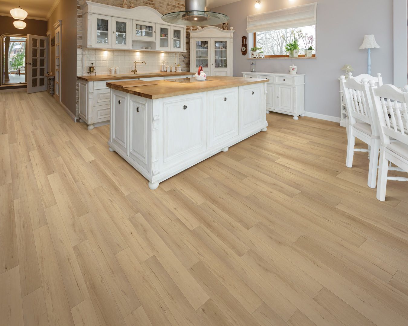 light wood floors in an open style kitchen