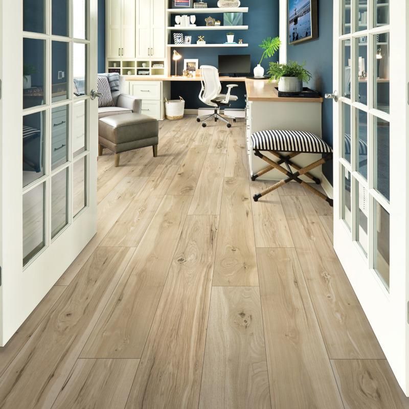 light wood floors in the entryway of a home