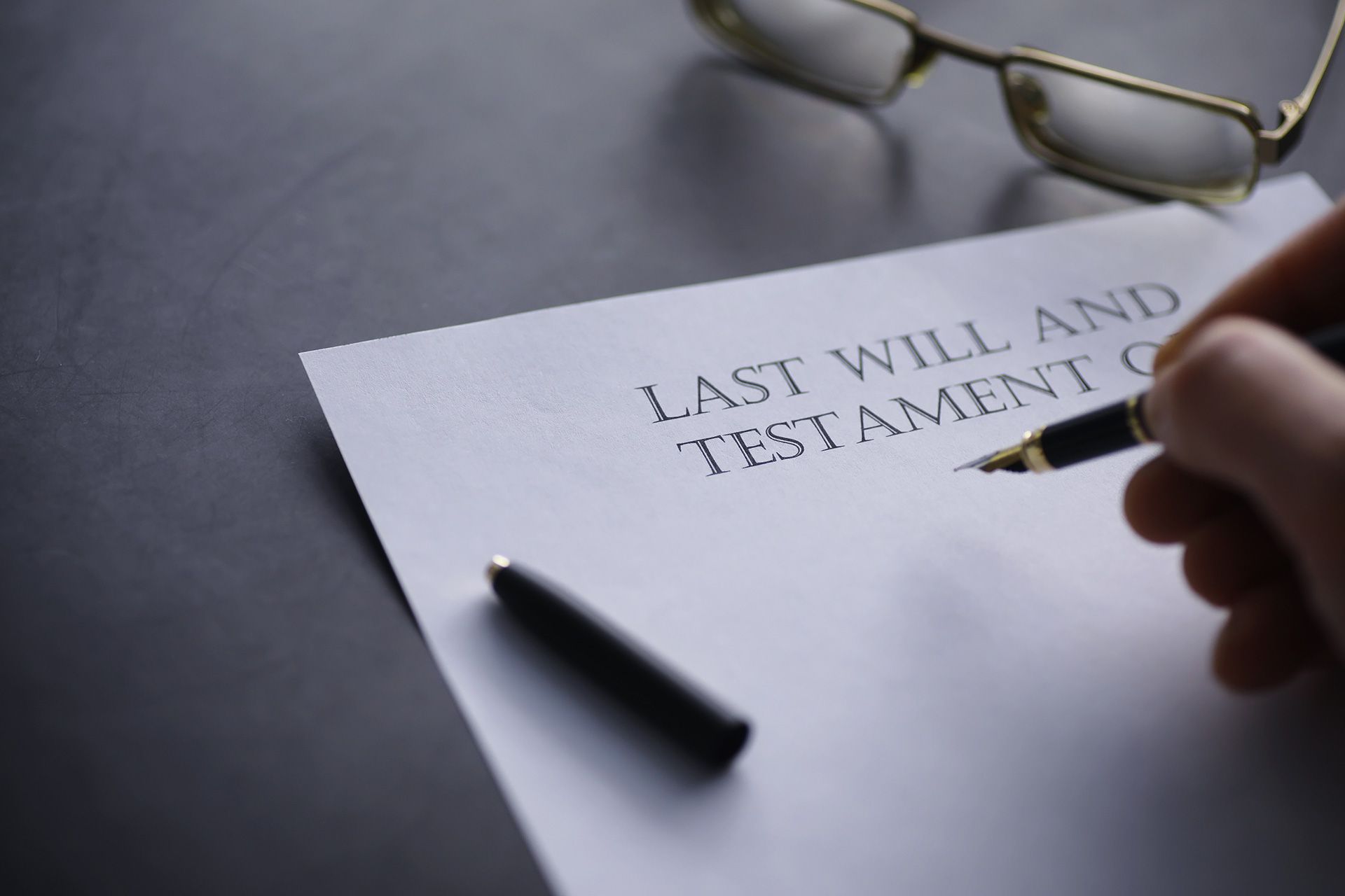Attorney discussing will planning with clients 