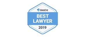 a blue and white badge that says best lawyer 2019