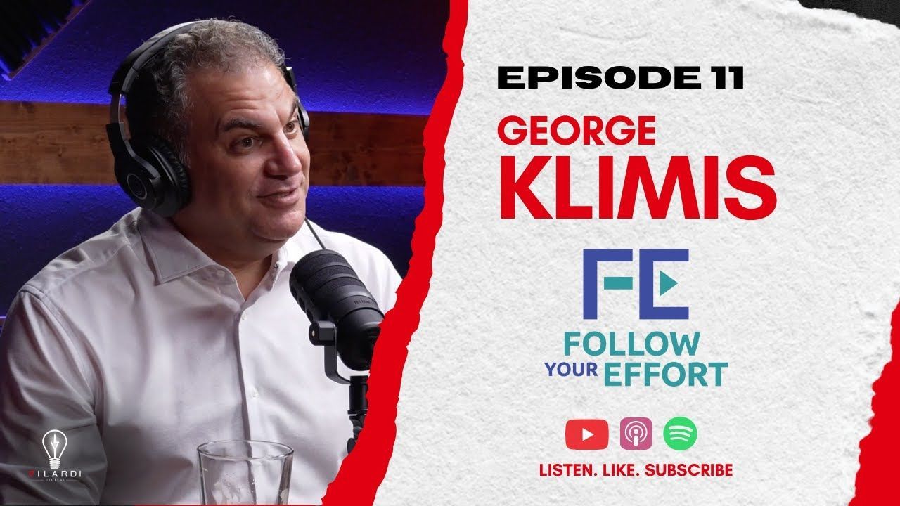 Man with headphones speaks into a microphone. Podcast episode 11 featuring George Klimis, 