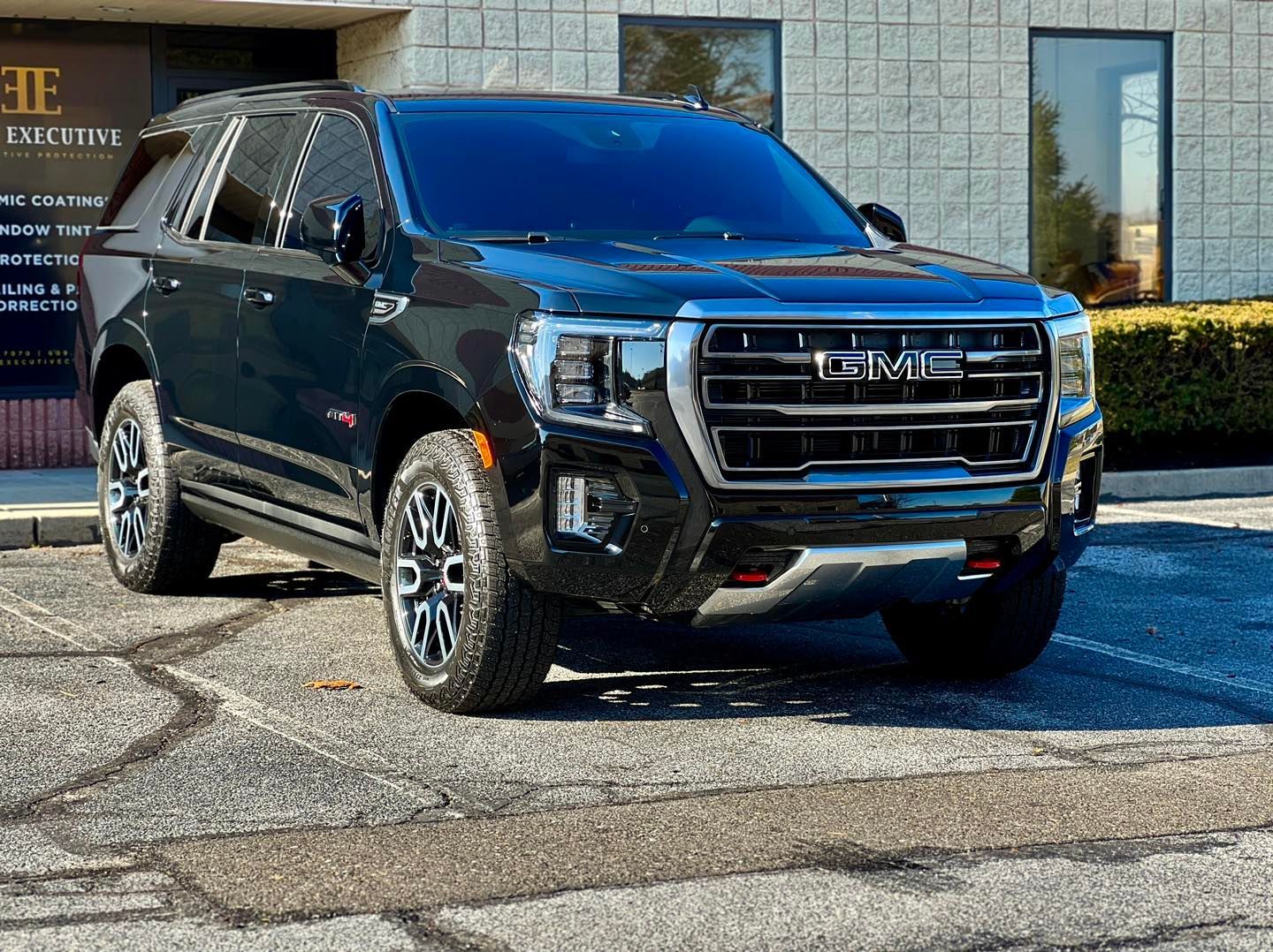 ceramic coated black vehicle parked outside