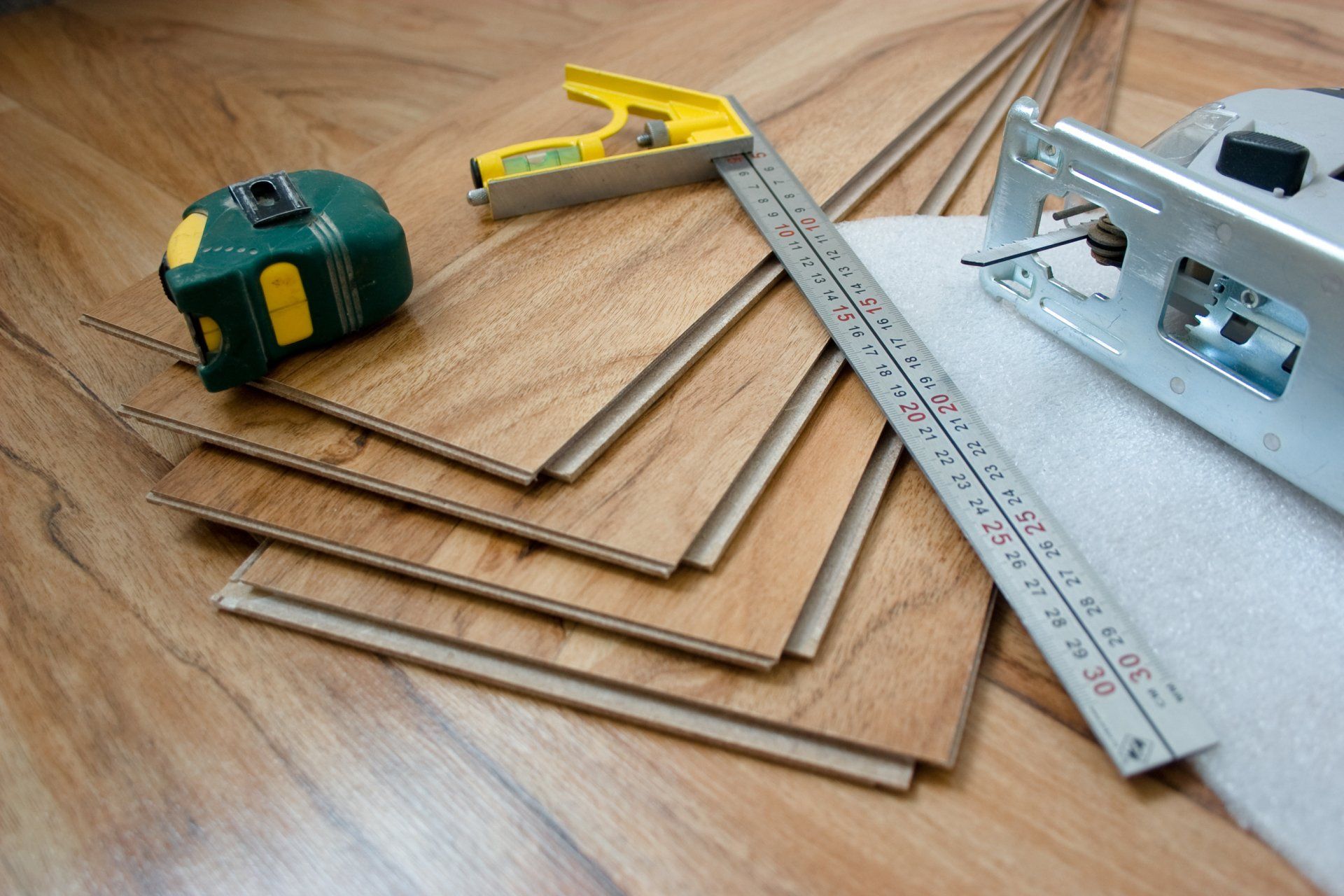 Measuring Tools And Luxury Vinyl - Altoona, WI - Dreamhouse Interiors