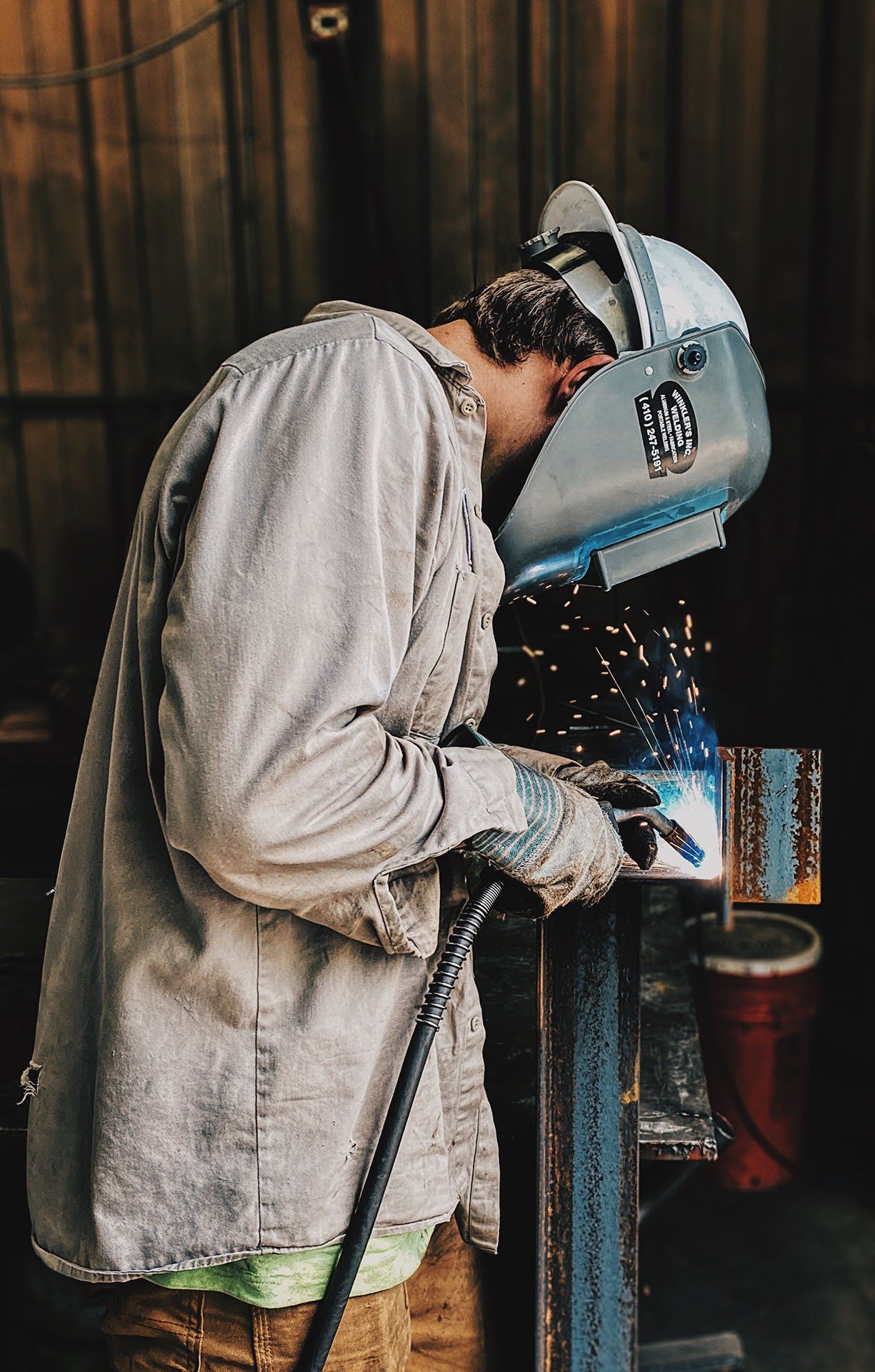 Man Welding a Metal — Baltimore, MD — Winkler's Inc