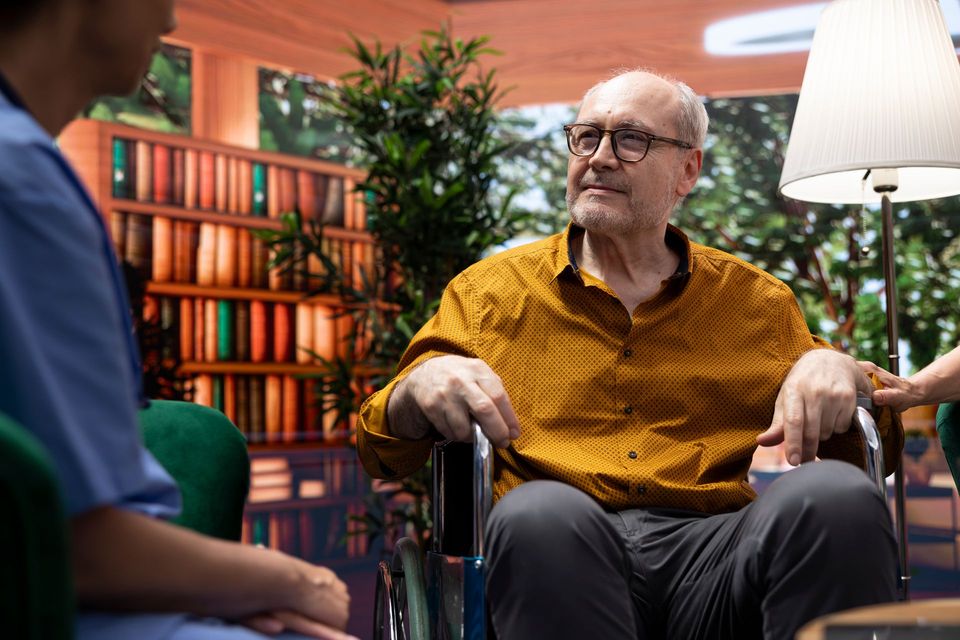 Care Remedy home health aide supporting an older man at home