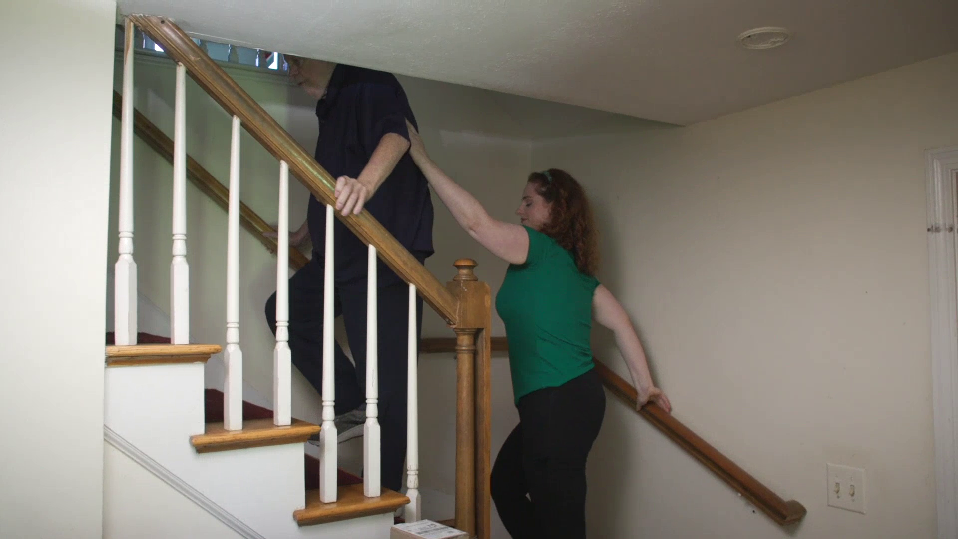 Care Remedy motorized stair chair on a Victorian staircase in Melrose MA