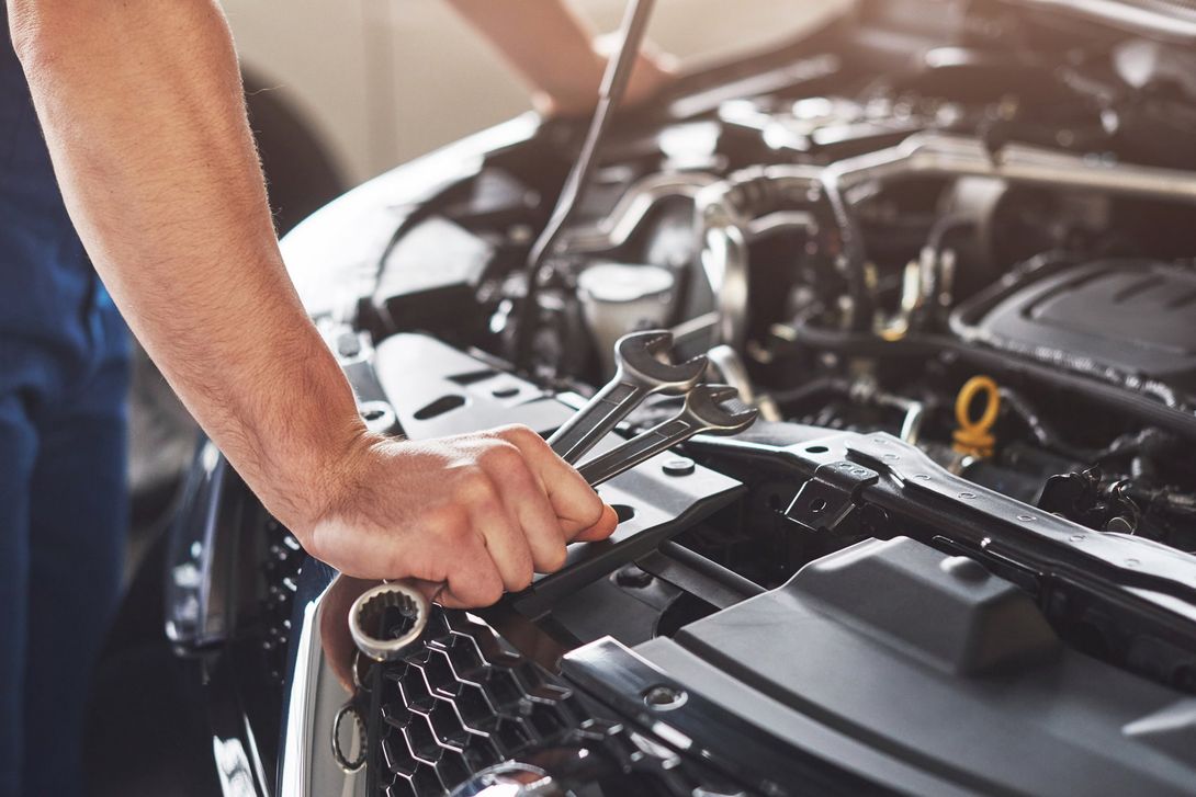 mechanic diagnosing a car