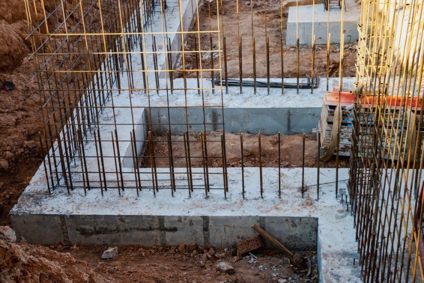 Concrete Foundation With Rebar Framework in Dirt — Comet Concreting in Drayton, QLD