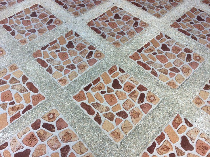 Diamond-patterned Tile Flooring With Stone-like Pieces — Comet Concreting in Drayton, QLD