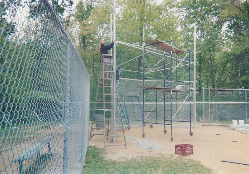Working on a Chain Link Fence — Clifton, NJ — All Jersey Fence Co.