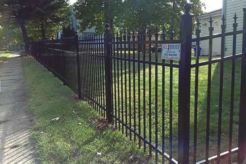 Black Wrought Iron Fence Surrounds a Lush Green — Clifton, NJ — All Jersey Fence Co.