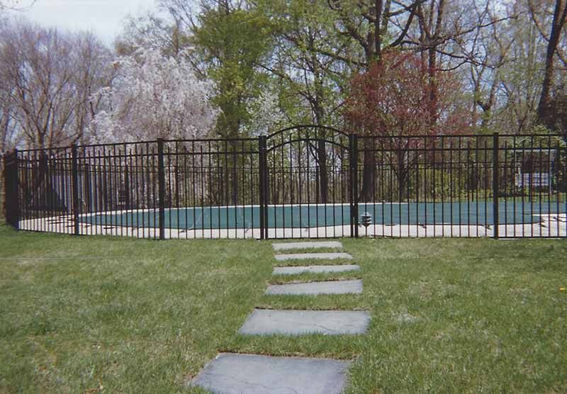Black Fence Surrounds a Swimming Pool — Clifton, NJ — All Jersey Fence Co.