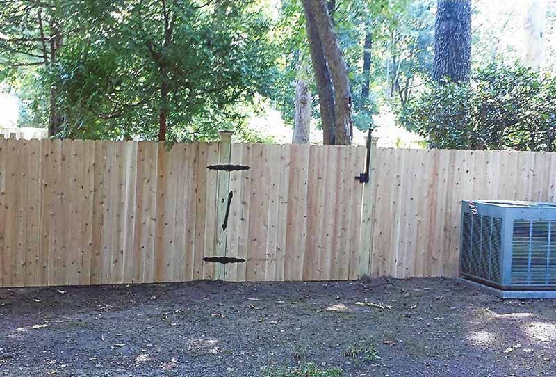 Wooden Fence Surrounds a Backyard — Clifton, NJ — All Jersey Fence Co.