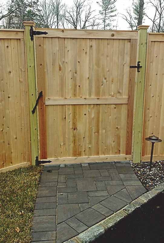 Wooden Fence With a Gate Leading to a Brick Walkway — Clifton, NJ — All Jersey Fence Co.