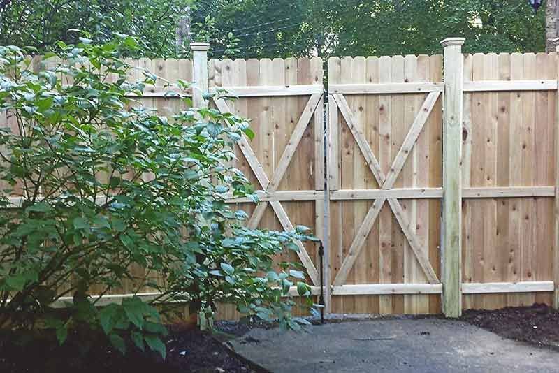 Wooden Fence With a Gate in the Backyard — Clifton, NJ — All Jersey Fence Co.