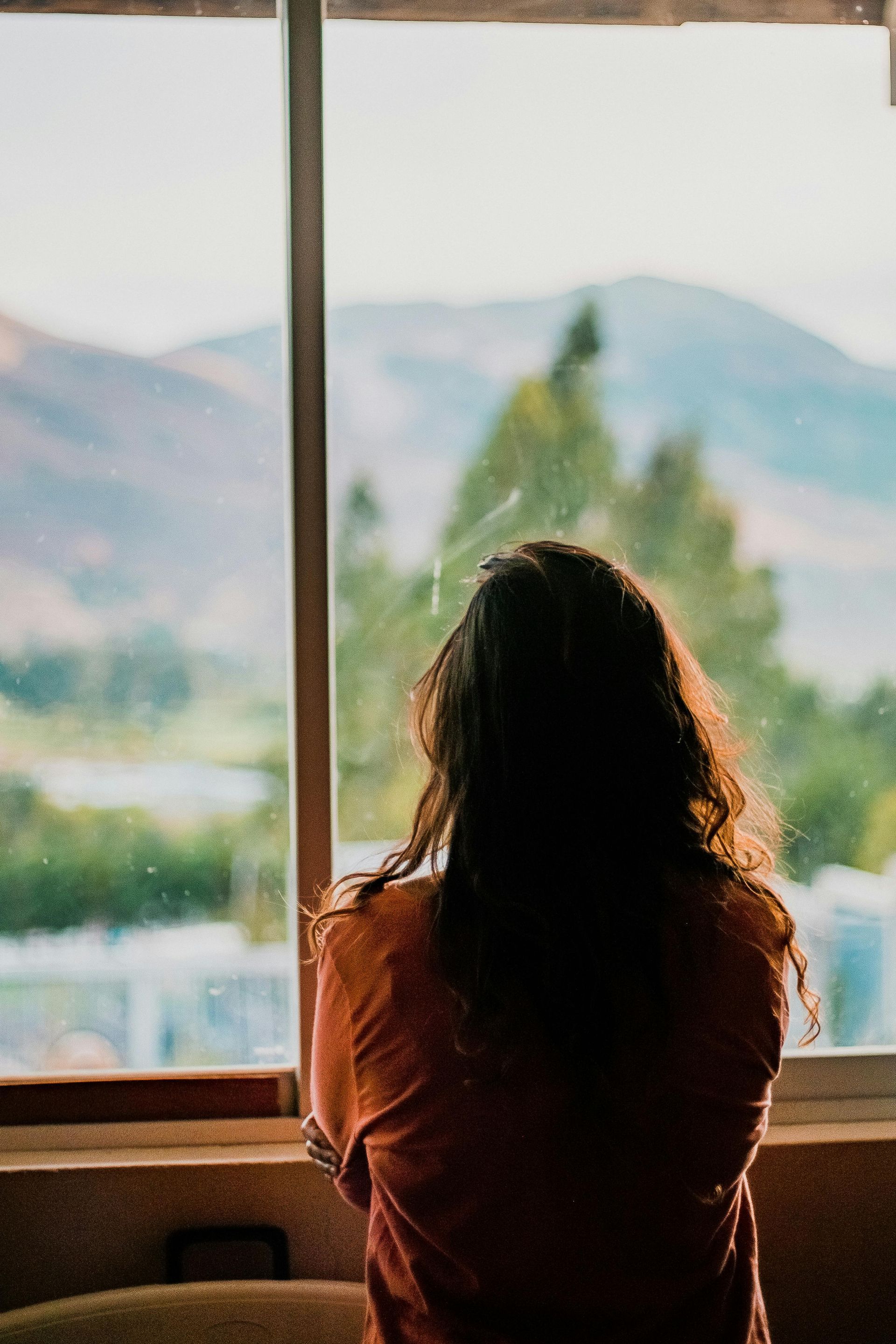 woman in front of a window